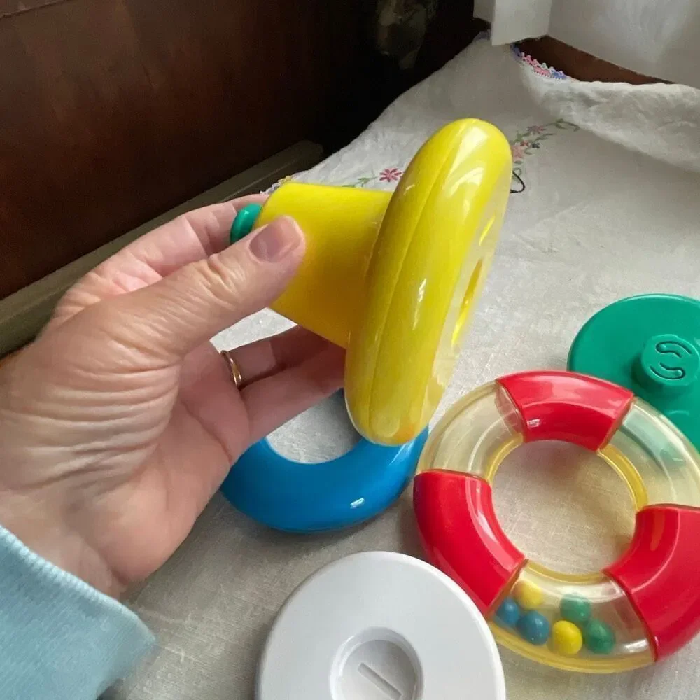 1996, Ring ‘n Roll Gerber Products Co. Toy Biz, Inc roundish rolling rattle infa